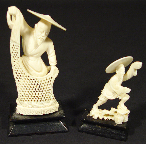 Appraisal: Two Chinese ivory figures one a fisherman clutching nets both