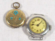 Appraisal: A gilt metal locket with floral engravings set with turquoise