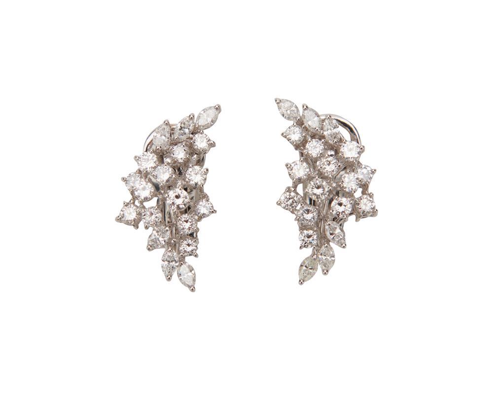 Appraisal: K Gold and Diamond Earrings the cluster earrings set with