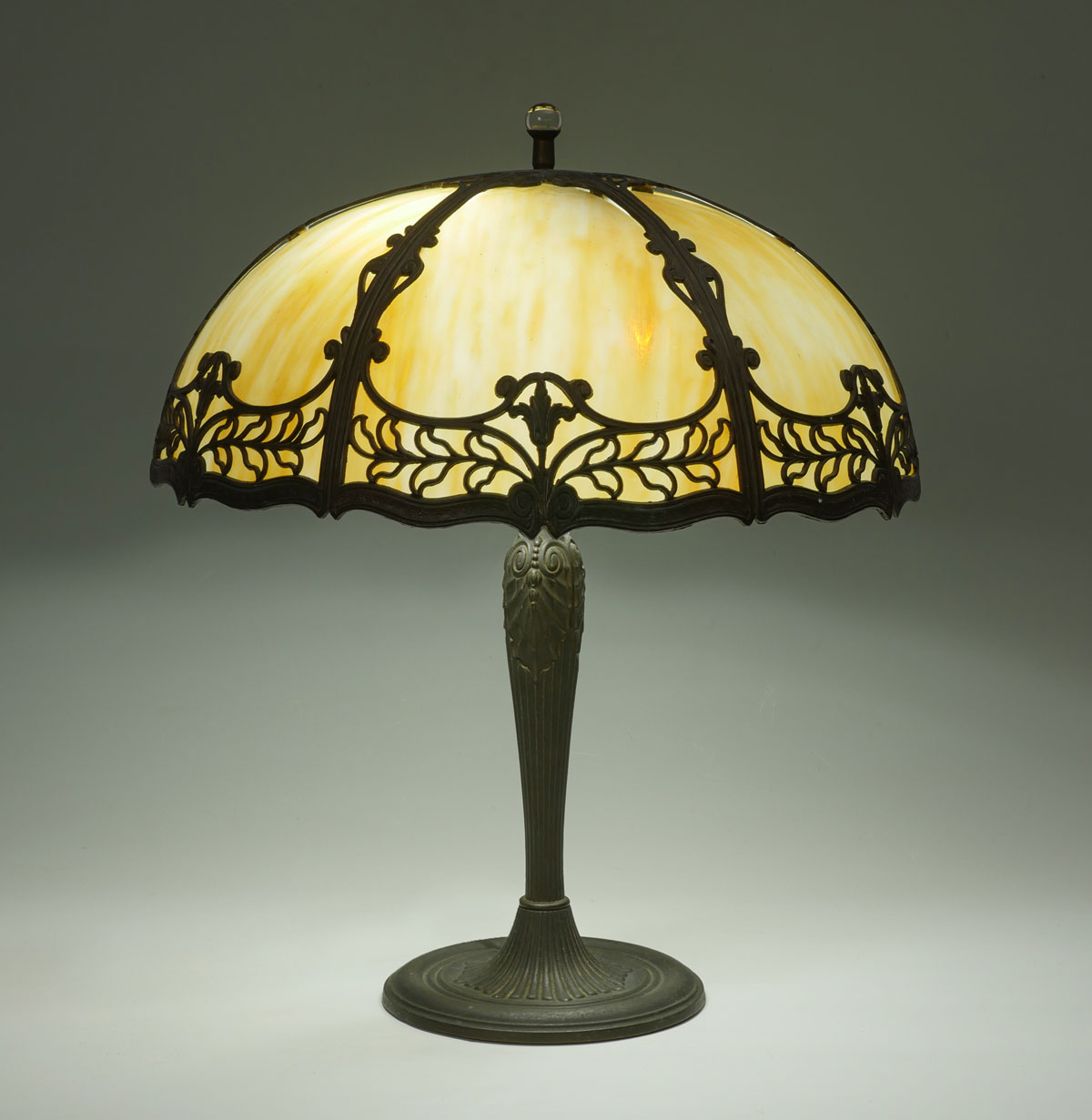 Appraisal: EDWARD MILLER CO -PANEL SLAG GLASS LAMP Surmounting glass sphere