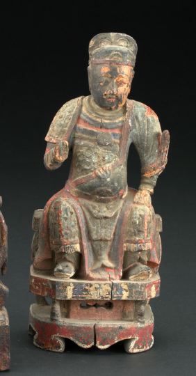 Appraisal: Chinese Provincial Carved and Polychromed Wooden Figure depicting a seated