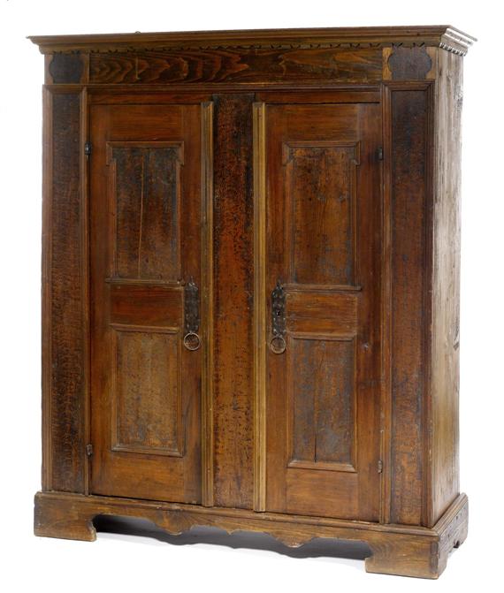 Appraisal: ARMOIRE alpine dated Dark stained and grained softwood Coffered doors