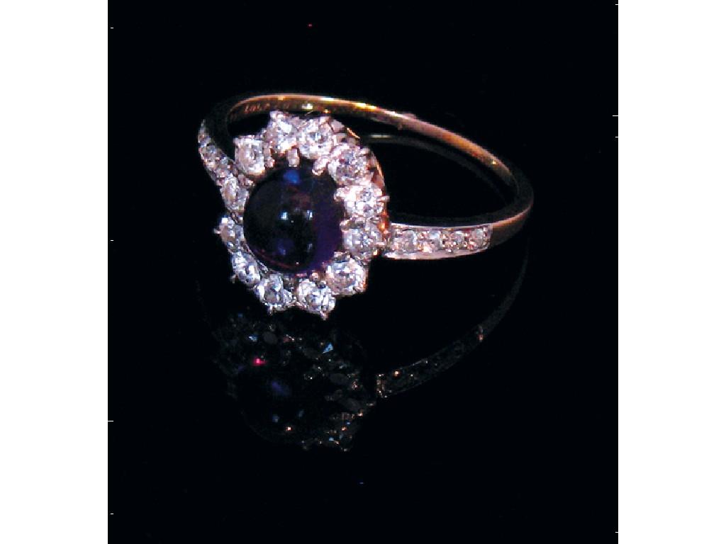 Appraisal: J E CALDWELL AN AMETHYST AND SAPPHIRE CLUSTER DRESS RING