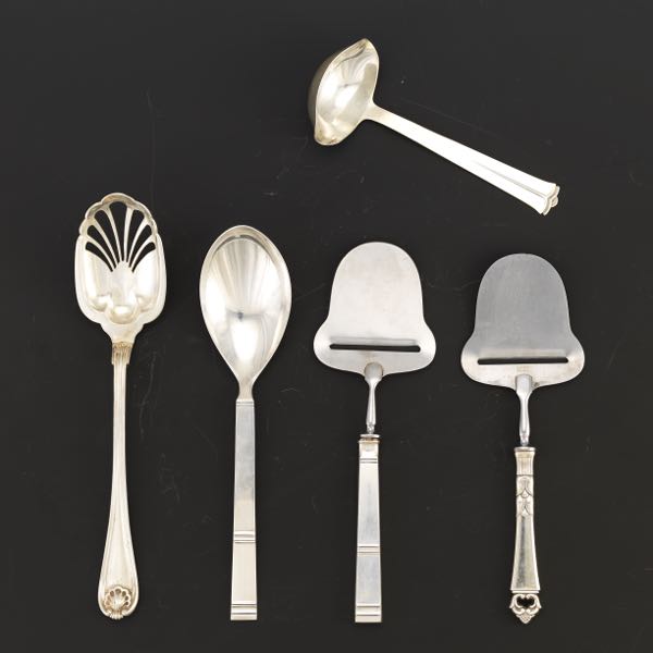 Appraisal: FIVE STERLING SERVING UTENSILS Two Danish cheese servers slicers with