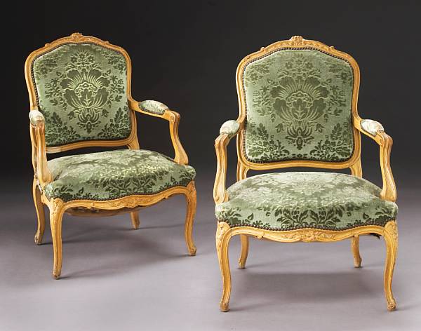 Appraisal: A pair of Louis XV style beechwood fauteuils th century