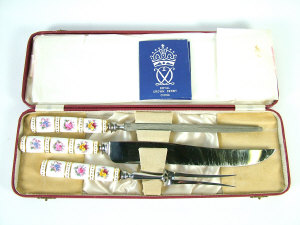 Appraisal: Royal Crown Derby three-piece carving set the porcelain handles decorated