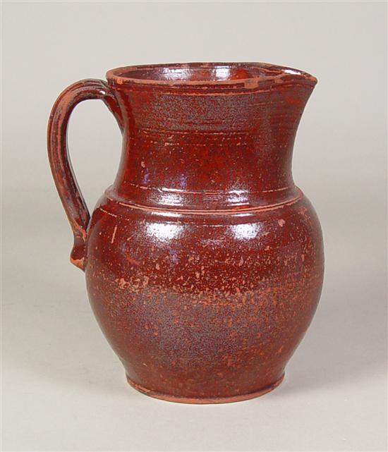 Appraisal: Southern Earthenware Pitcher Early th Century Applied ribbed handle with