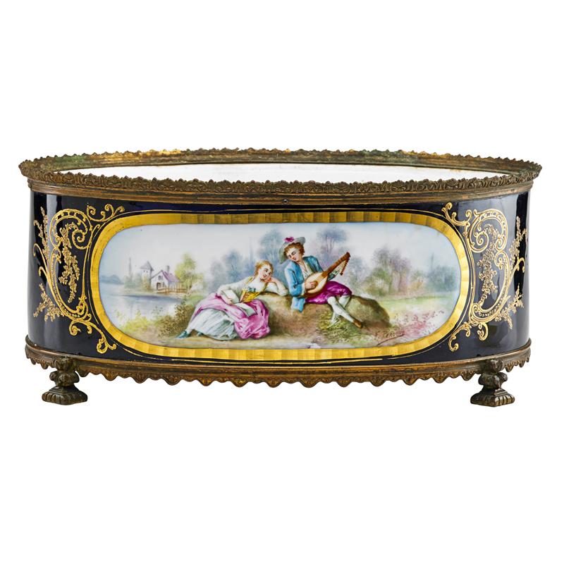 Appraisal: SEVRES PORCELAIN CENTERPIECE Gilt-bronze mounted with hand-painted reserves of maiden