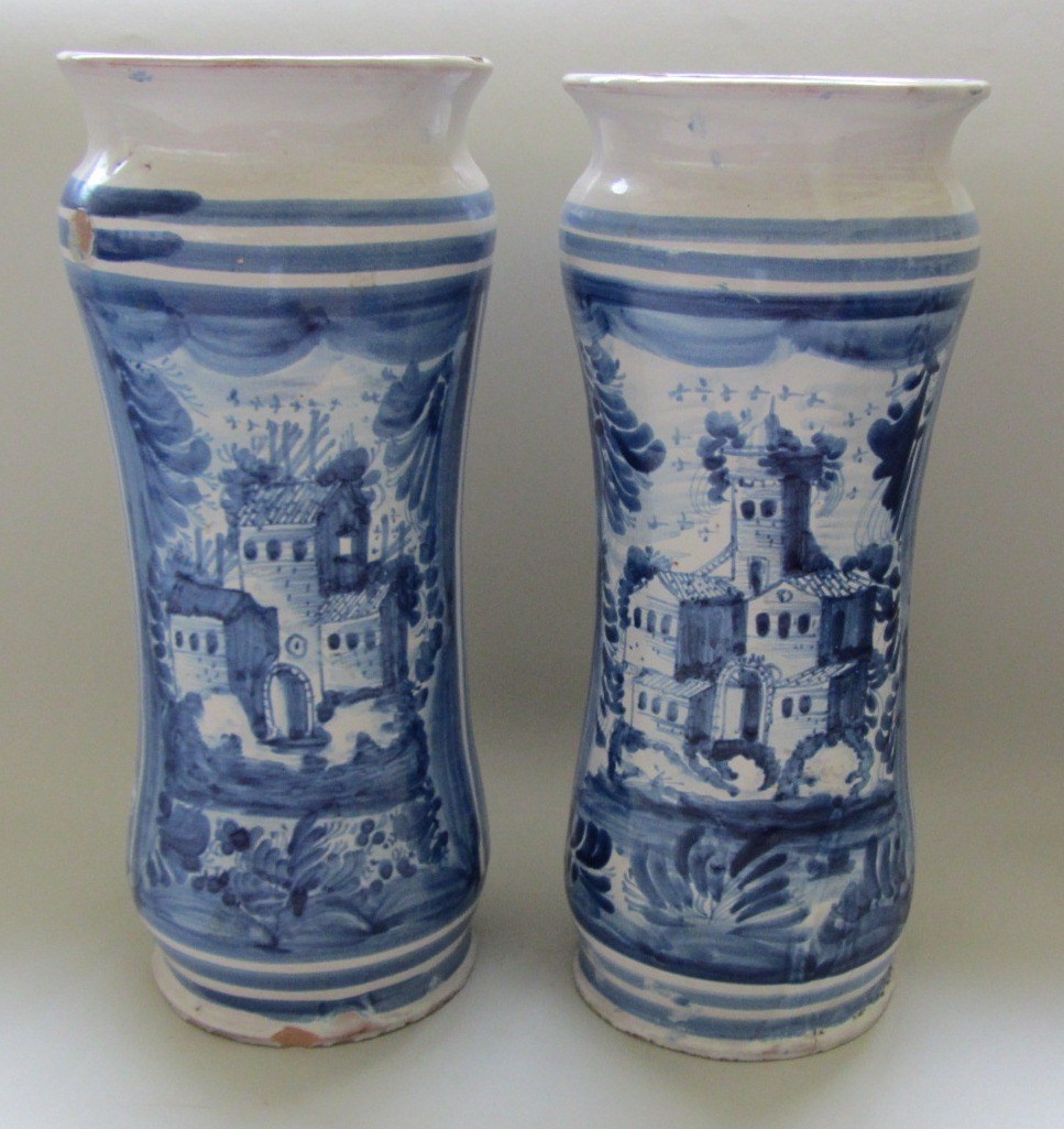 Appraisal: A pair of Neapolitan maiolica blue and white albarelli th