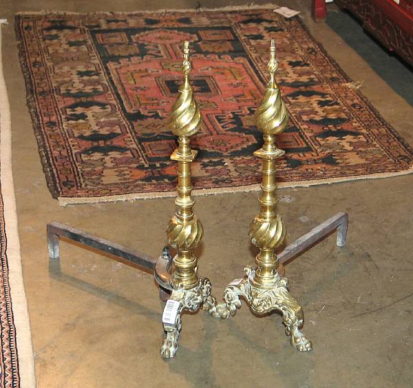 Appraisal: A pair of Rococo style brass andirons mid th century