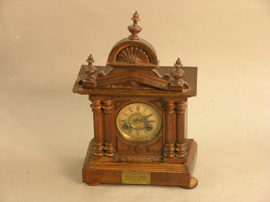 Appraisal: A Black Forest mantel clock with gong-striking movement in architectural