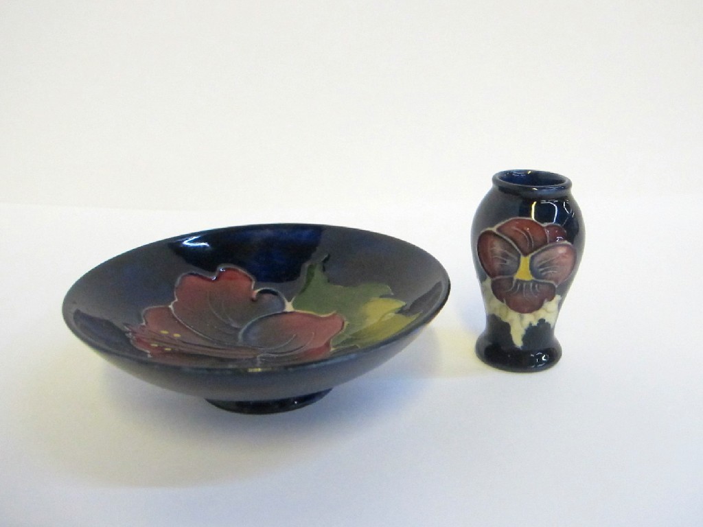 Appraisal: Moorcroft miniature pansy vase high and a small hibiscus dish