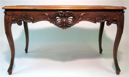 Appraisal: Louis XV style oak bureau plat The serpentine lea Ther