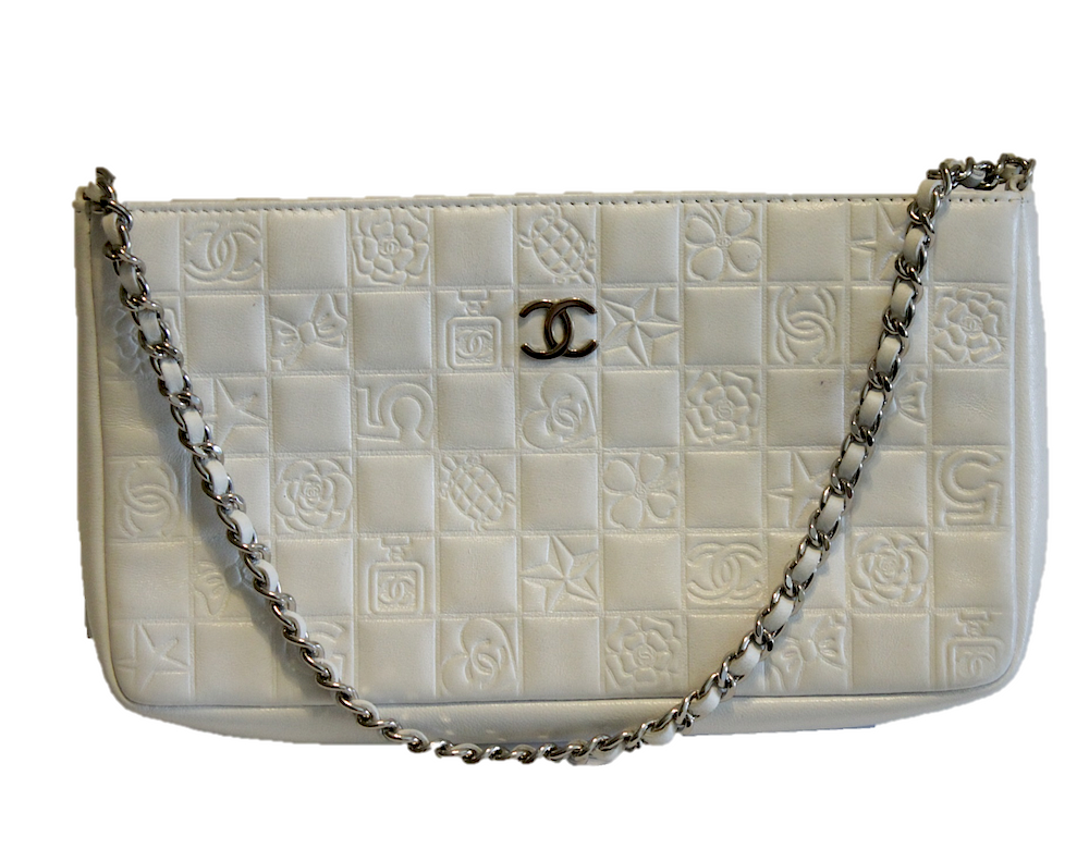 Appraisal: White Embossed CHANEL Vintage Bag Vintage Chanel bag is white