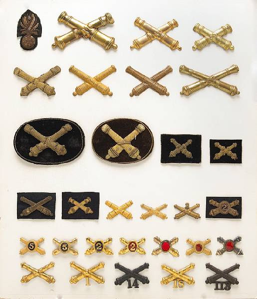 Appraisal: A large group of Artillery insignia Comprising Embroidered Ordnance grenade