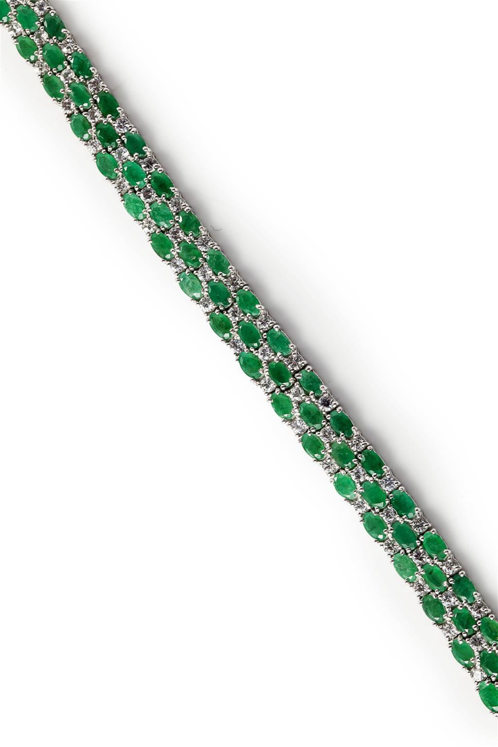 Appraisal: An emerald and colourless gem set bracelet claw set with