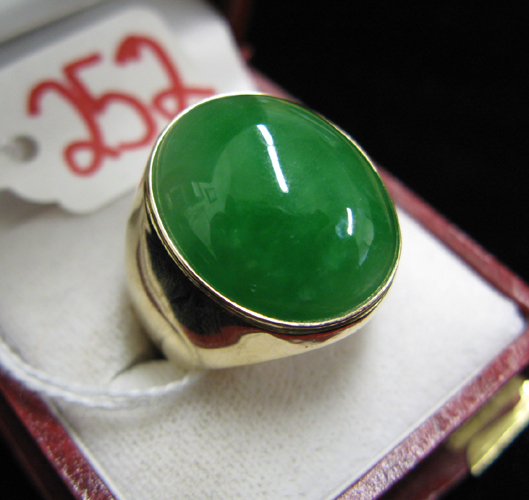 Appraisal: MAN'S JADE AND FOURTEEN KARAT GOLD RING set with an