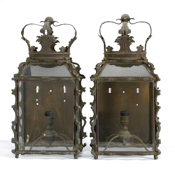 Appraisal: A pair of Baroque style patinated bronze wall lanterns early