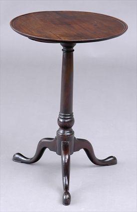 Appraisal: PENNSYLVANIA CHIPPENDALE MAHOGANY TRIPOD CANDLESTAND The circular tilting dished top