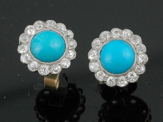 Appraisal: A PAIR OF TURQUOISE AND DIAMOND CLUSTER EARRINGS Each set