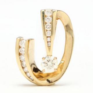 Appraisal: KT Gold and Diamond Slide Pendant the open form yellow