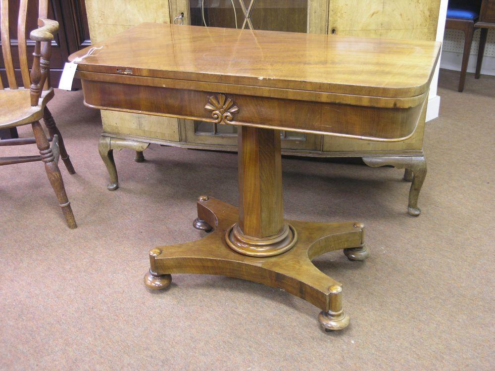 Appraisal: A Victorian mahogany 'D' shaped card table hinged top enclosing