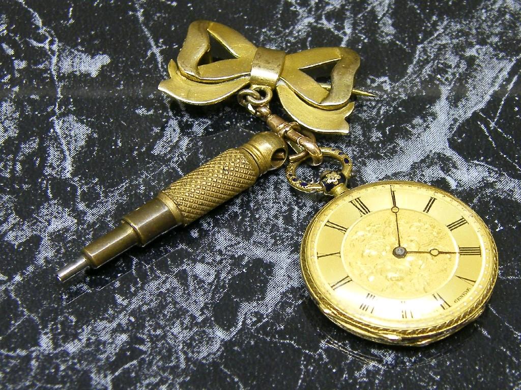 Appraisal: Attractive Swiss gold and enamel cylinder fob watch the dial