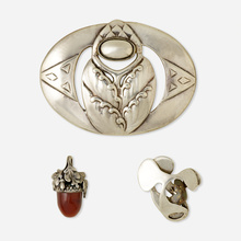 Appraisal: ACORN PENDANT AND TWO ABSTRACT BROOCHES Comprising an acorn pendant