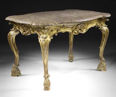 Appraisal: A large th century carved giltwood and gesso marble topped