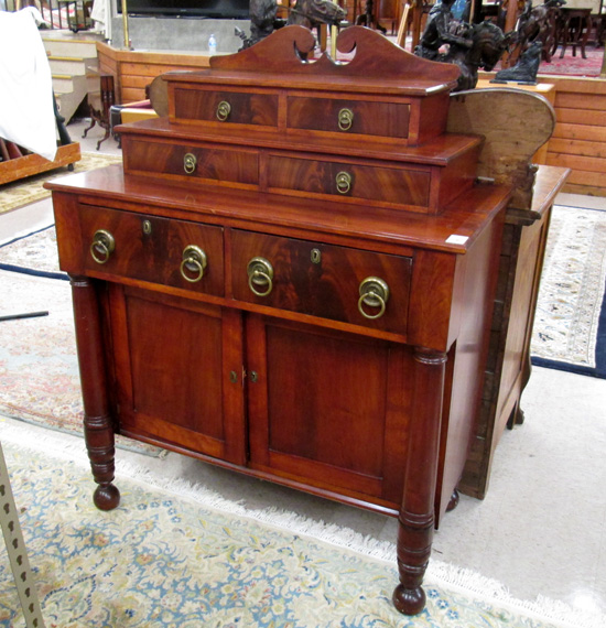 Appraisal: CLASSIC EMPIRE MAHOGANY DRESSER American mid- th century having a