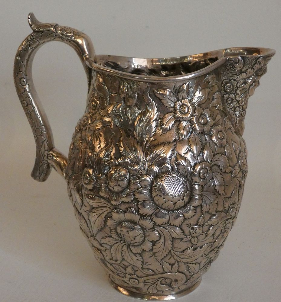 Appraisal: S KIRK REPOUSSE STERLING JUG Beautiful sterling silver floral repousse