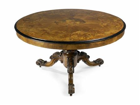 Appraisal: A Victorian walnut and marquetry breakfast table the circular radial