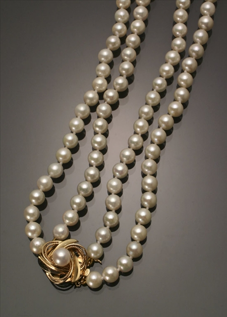 Appraisal: Matinee Length Cultured Pearl Necklace Knotted The double strand having