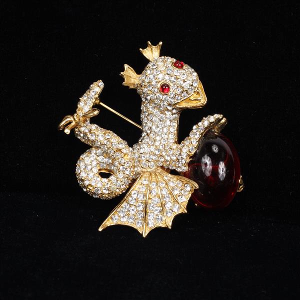 Appraisal: KJL Kenneth J Lane pave fantasy dragon brooch holding amber