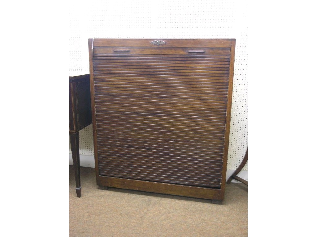 Appraisal: The Arvon'- a stained beech tambour fronted filing cabinet numerous