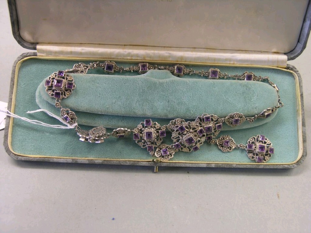 Appraisal: A white metal and amethyst necklace