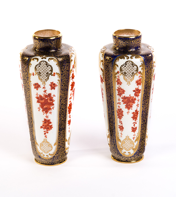 Appraisal: PAIR OF NICELY DECORATED ROYAL DOULTON VASES England st quarter-