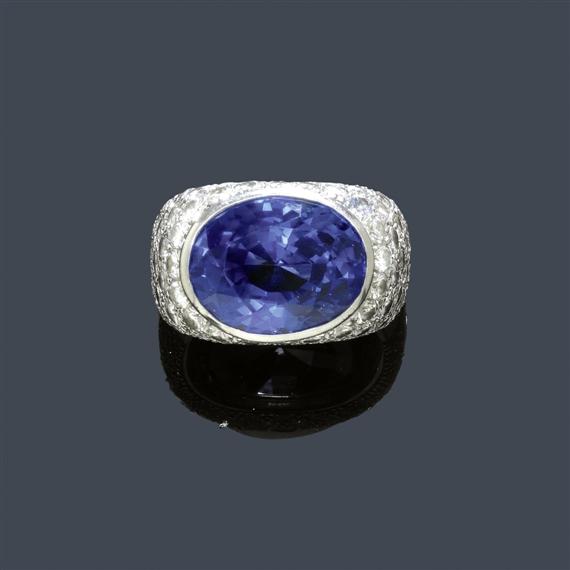 Appraisal: A SAPPHIRE AND DIAMOND RING E LOOSLI White gold Fancy