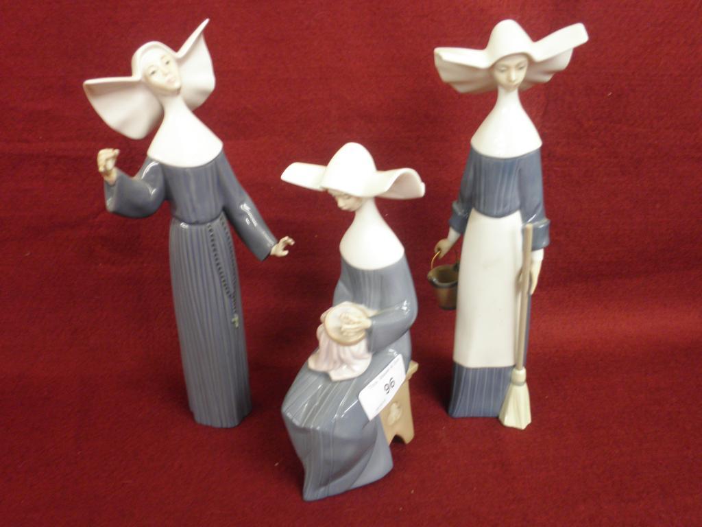 Appraisal: Three Lladro porcelain figures of nuns