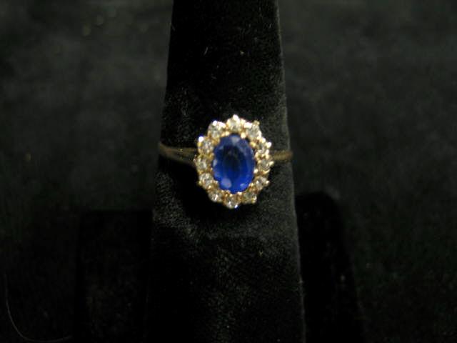 Appraisal: Sapphire Diamond Ring diamonds totaling carat oval blue sapphire totaling