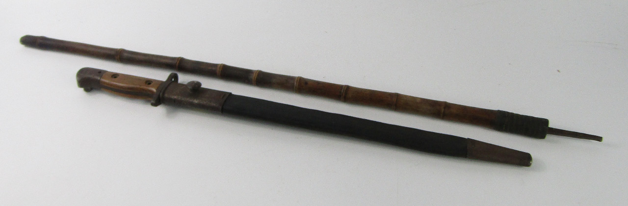 Appraisal: A bayonet sheathed and a Colaux Cie Klingenthal sword stick