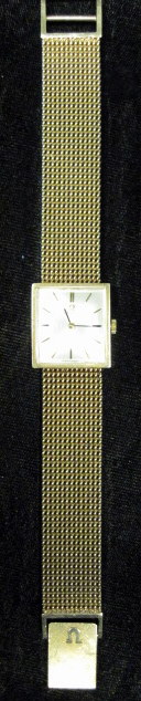 Appraisal: Gentleman's karat yellow gold wristwatch Omega Rectangular cased silver tone