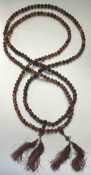 Appraisal: Pr Chinese carved amber necklaces depicting ''longevity'' characters ''L