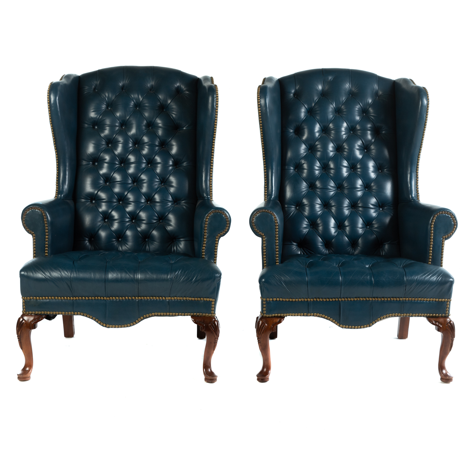 Appraisal: A PAIR OF CLASSIC LEATHER TUFTED LEATHER WING CHAIRS Third