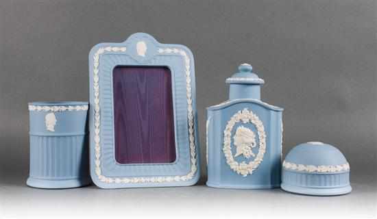 Appraisal: Wedgwood blue jasperware three-piece desk set and similar tea caddy