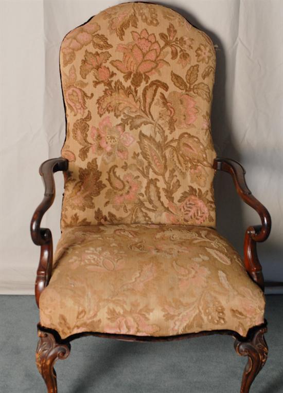 Appraisal: A Georgian-style High Back Arm Chair having a shaped back