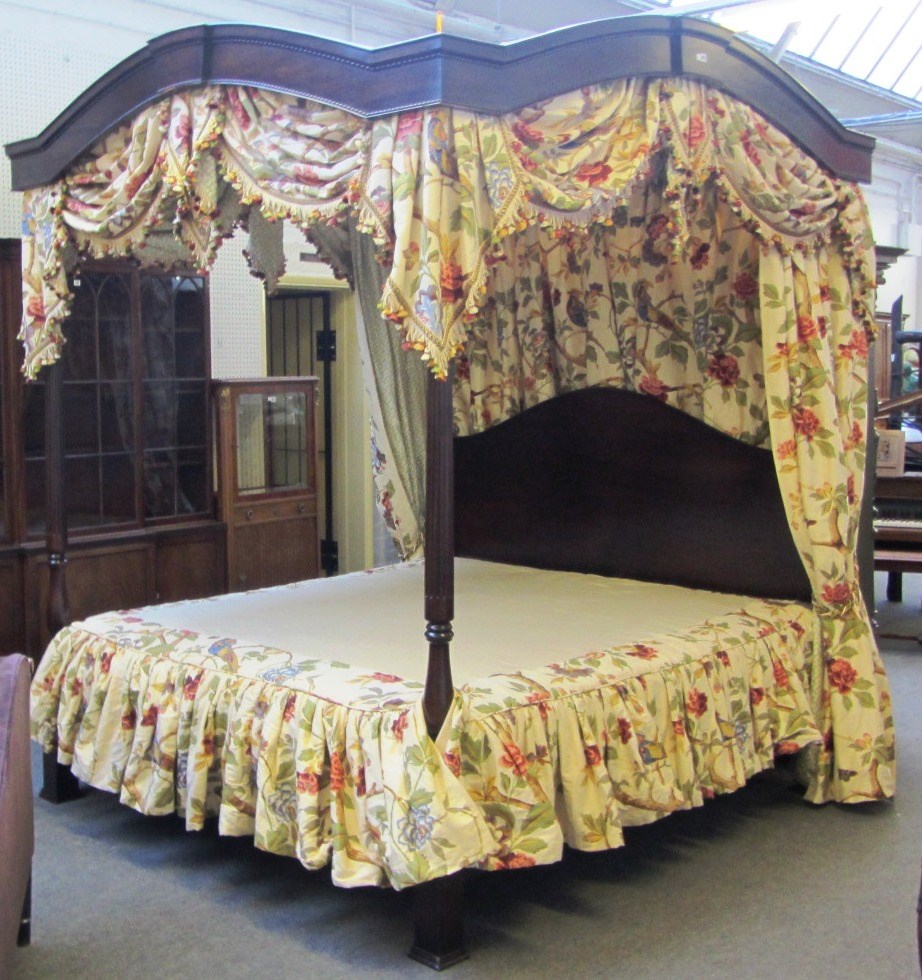 Appraisal: A th century hardwood four poster bed with turned and