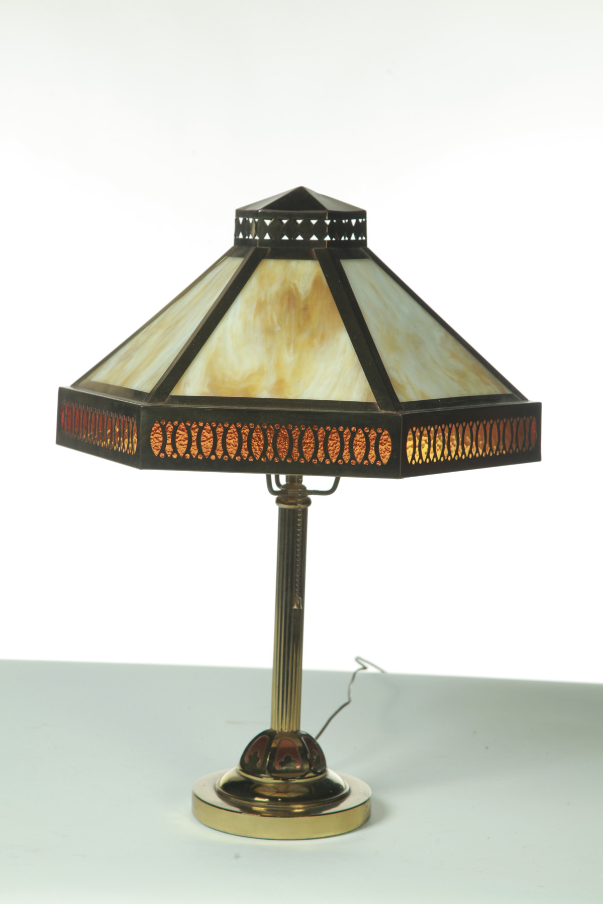 Appraisal: BRASS SLAG GLASS TABLE LAMP American th century Shaped hexagonal