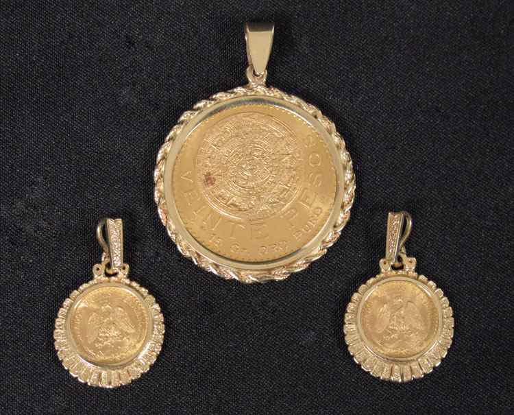 Appraisal: THREE GOLD PESO COIN PENDANTS K yellow gold coin frames