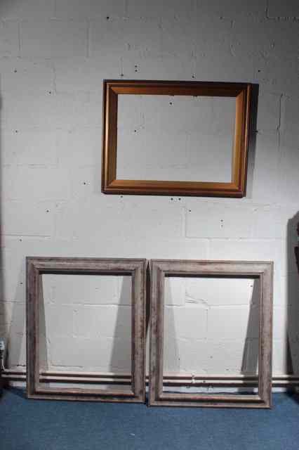 Appraisal: A PAIR OF TH CENTURY STYLE MOULDED GILT PICTURE FRAMES